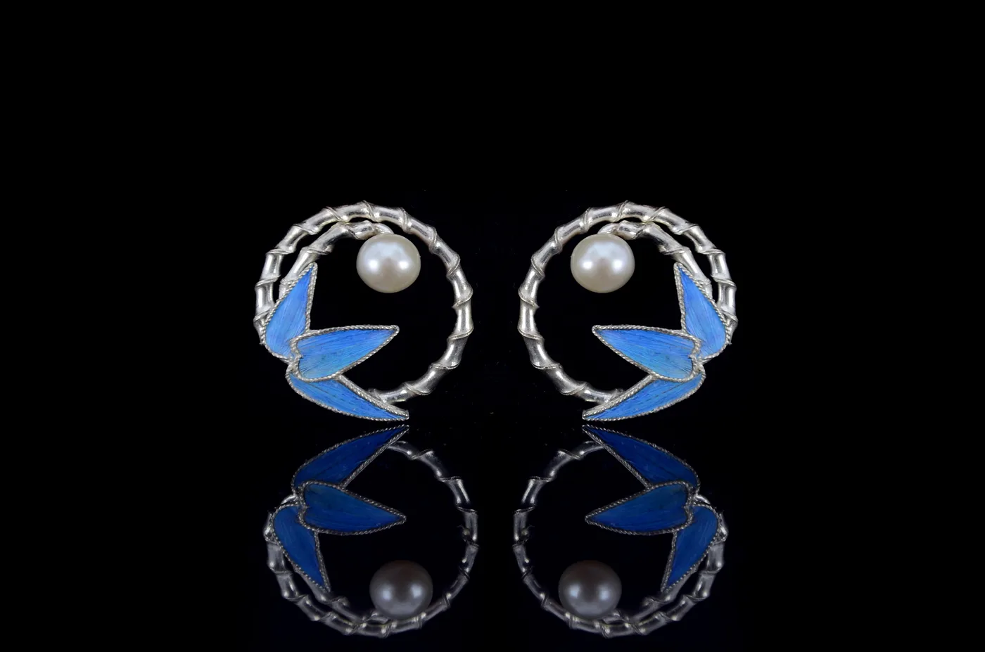 Bamboo earrings worked in fine silver filigree.