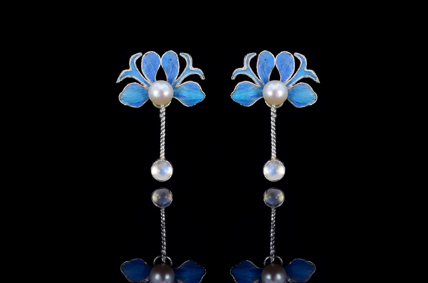 Silhouette of Peony earrings: openwork filigree peony blooms.