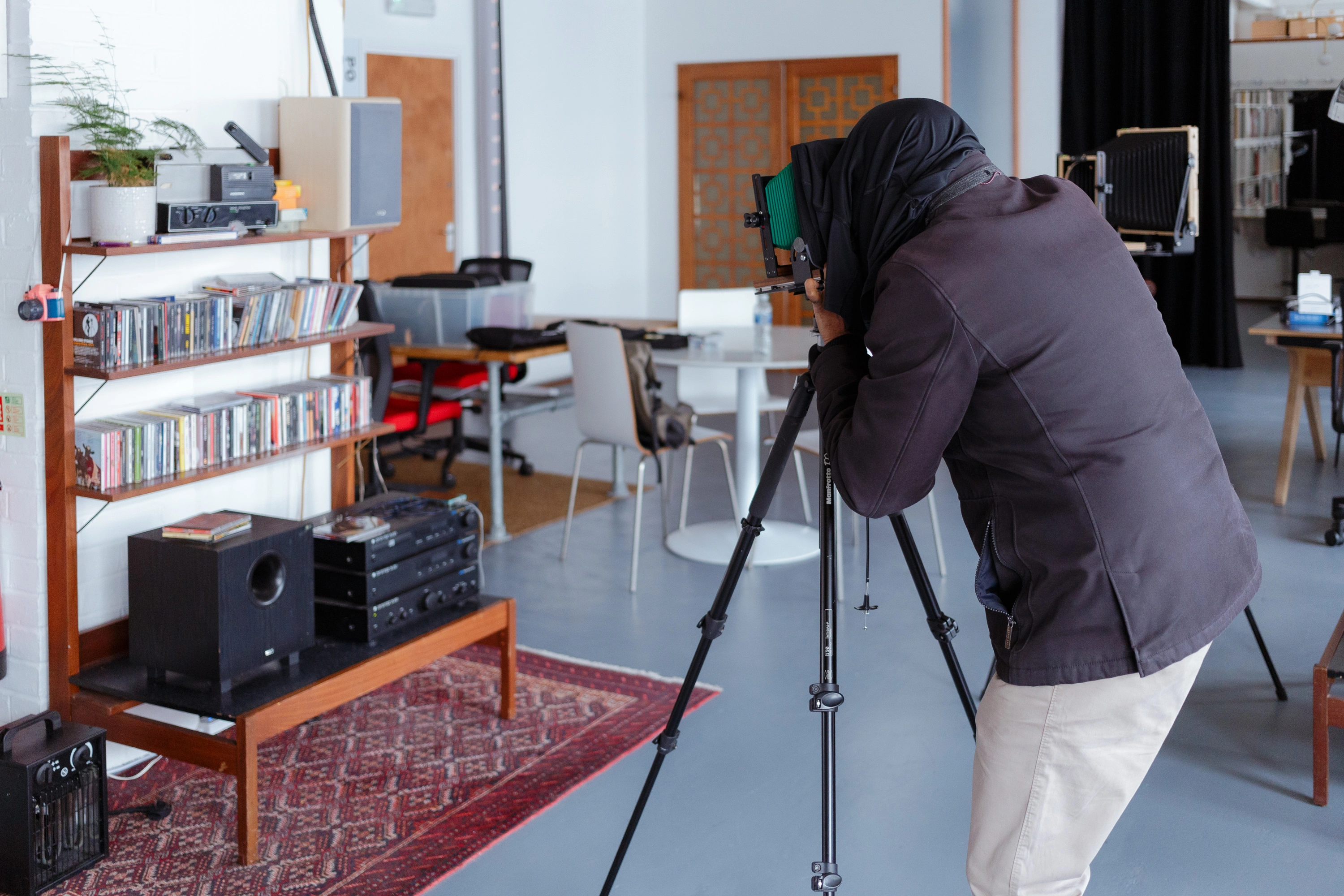Shooting under the dark cloth - the view camera demands full concentration and deliberate movement